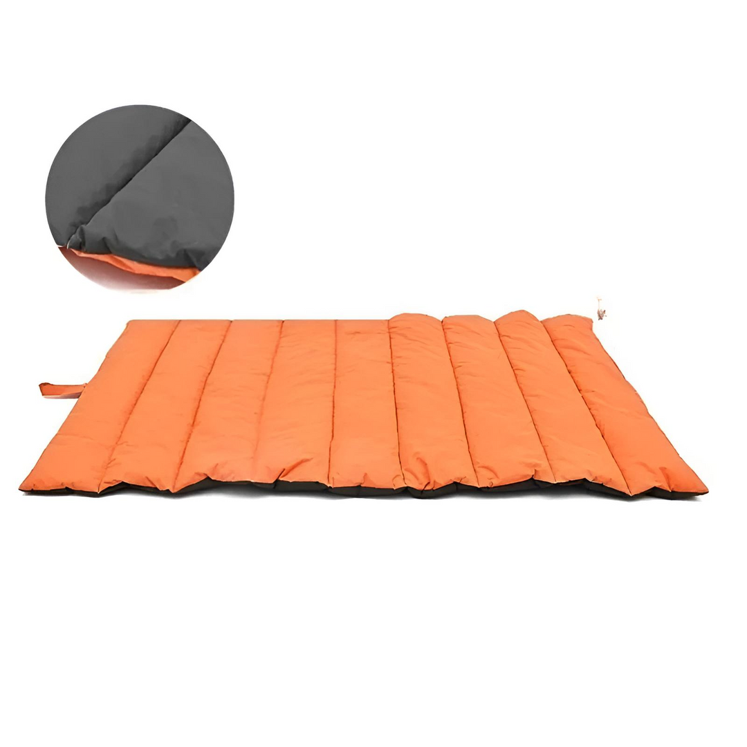 Compact folded black waterproof pet mat with handle, ideal for travel and camping, durable dog bed.