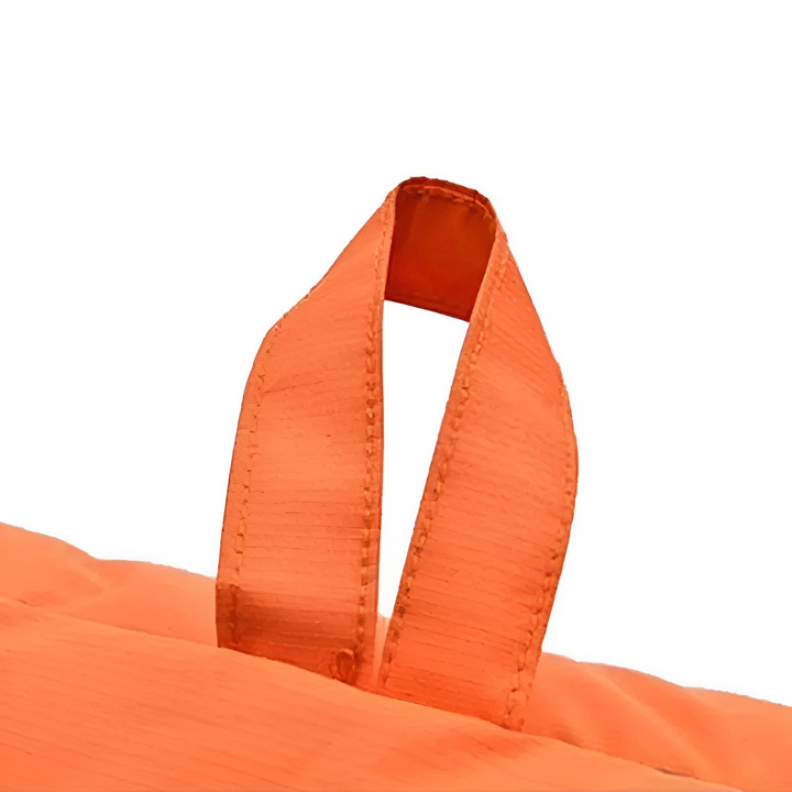 Close-up of the waterproof fabric texture of a durable pet travel mat, designed for outdoor use and easy clean.