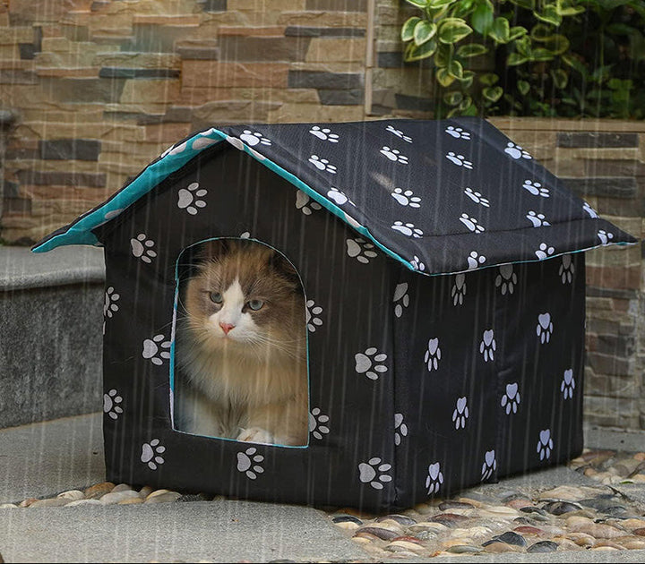 Outdoor pet shelter: waterproof cat house with self-warming pad, foldable design