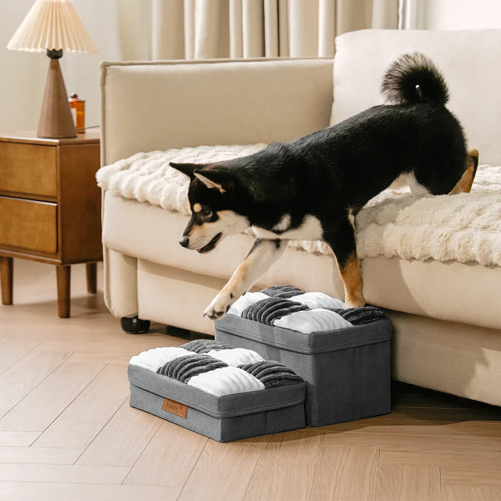 Portable foldable pet stairs with storage, lightweight and easy to carry for travel.