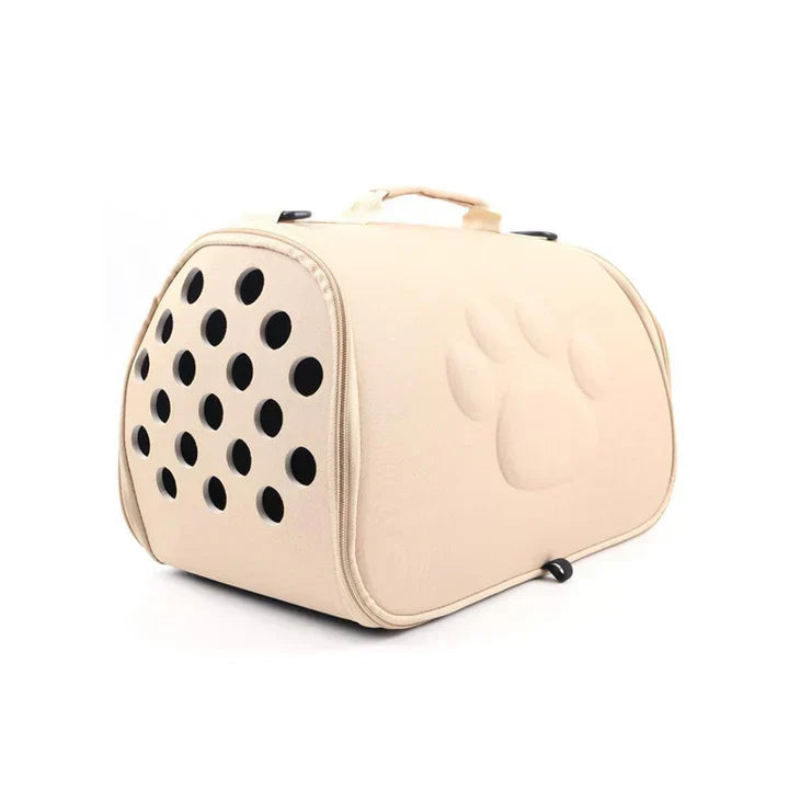 A cat peaking out from a portable foldable pet travel carrier bag in a car.
