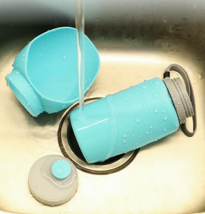 Compact pet travel bowl and water bottle combo, ideal for dog walks
