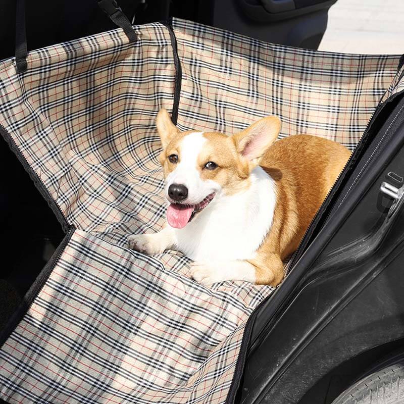Black oxford fabric dog car seat cover, foldable and waterproof, essential pet accessory for safe travel.