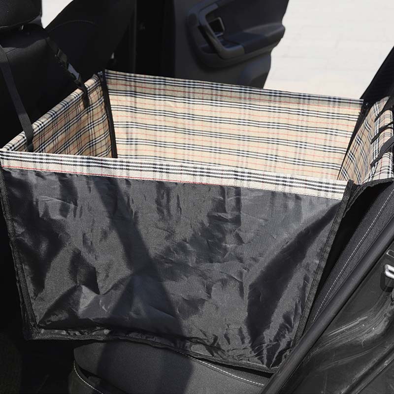 Close-up of the durable, easy-clean oxford fabric on a foldable waterproof dog car seat cover.