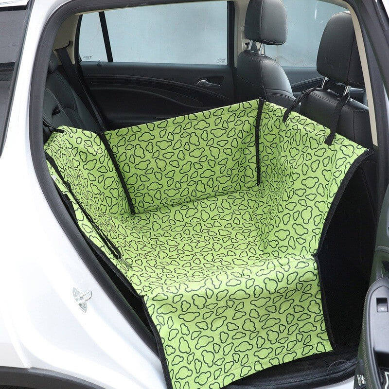 Foldable dog car seat cover with adjustable straps, ensuring a snug fit for car protection during pet journeys.