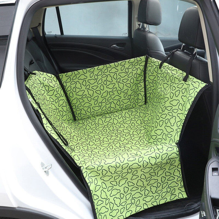 Foldable dog car seat cover with adjustable straps, ensuring a snug fit for car protection during pet journeys.