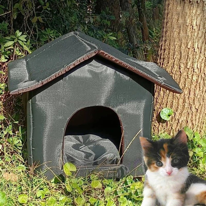 Gray foldable outdoor pet bed, waterproof & durable, providing a cozy cat cave or dog shelter