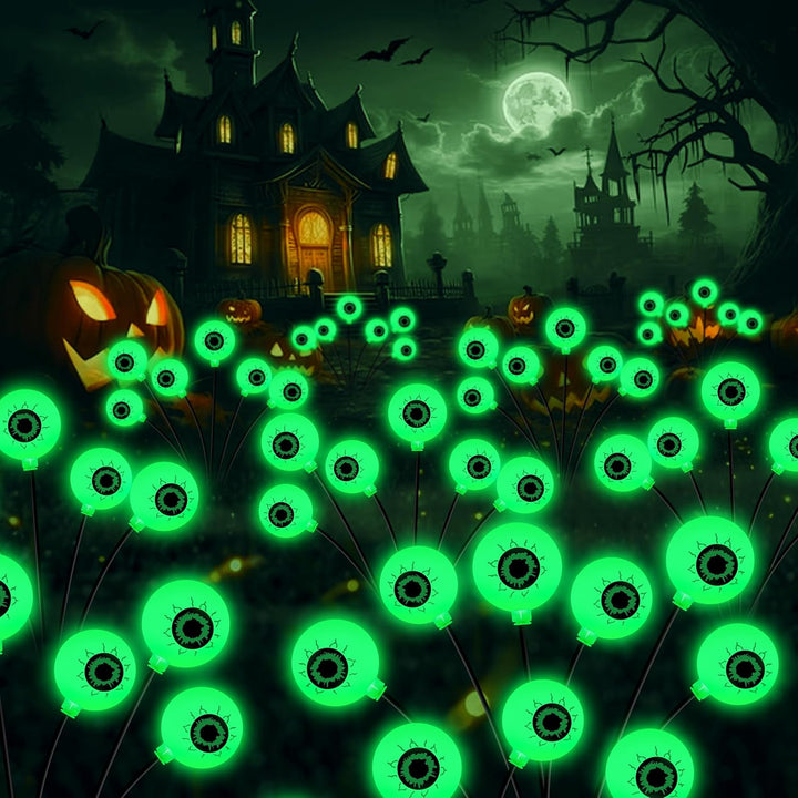 A set of 4 solar LED eyeball lights, perfect for frightful outdoor Halloween decor