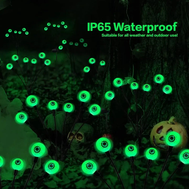 Spooky eyeball lawn ornaments, solar-powered for easy installation outdoors