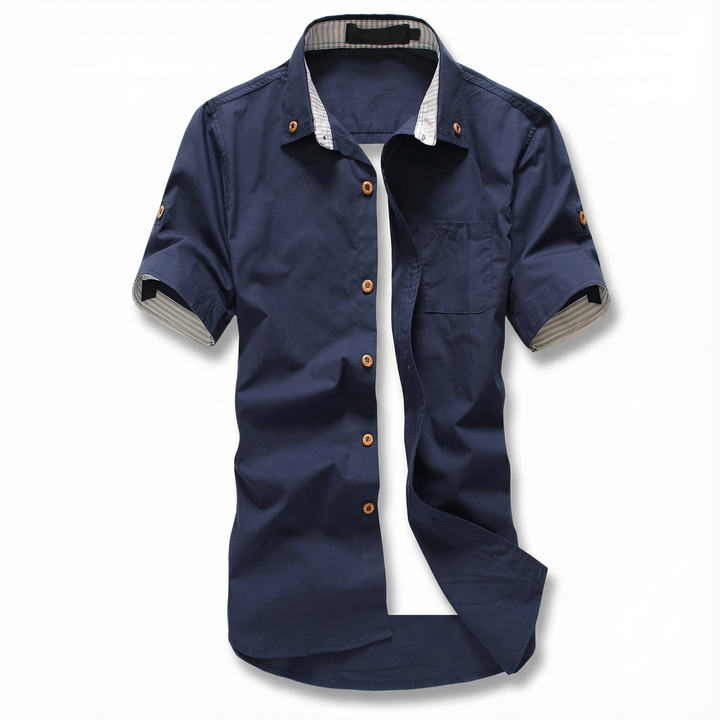 Relaxed fit men's cotton shirt, short sleeve, button-up, featuring modern contrast stitch detail.