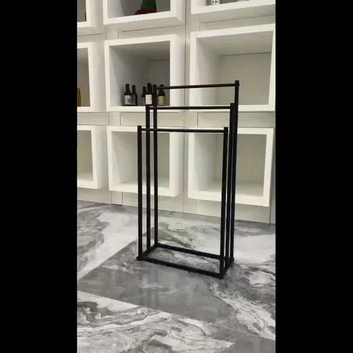 Durable freestanding steel towel rack with a sleek design. Optimal bathroom storage for multiple towels.