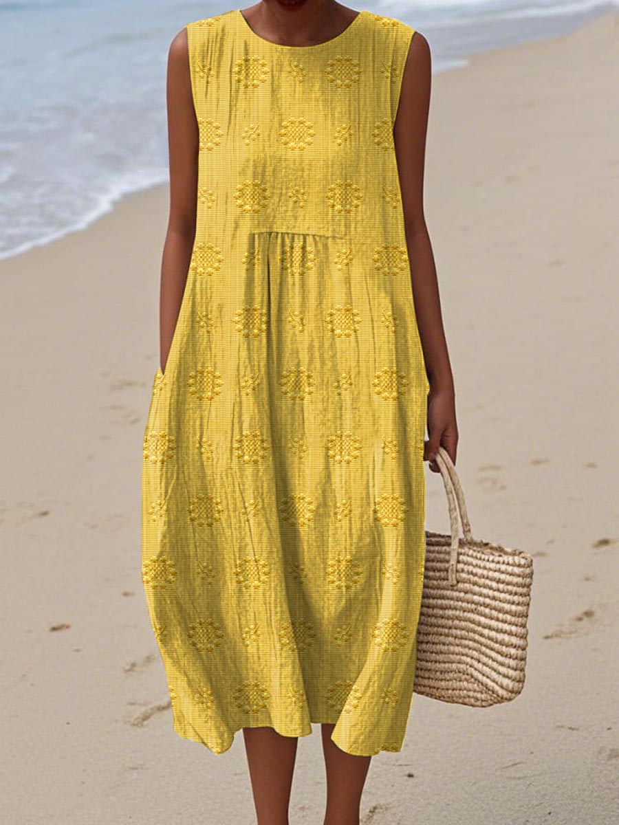 Woman twirling in a comfortable sleeveless flowy midi dress, ideal for summer vacations, beach outings, or casual everyday wear.