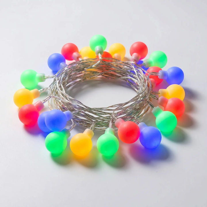 Multicolored frosted globe LED string lights, perfect for festive party decor, patio, or vibrant bedroom lighting.