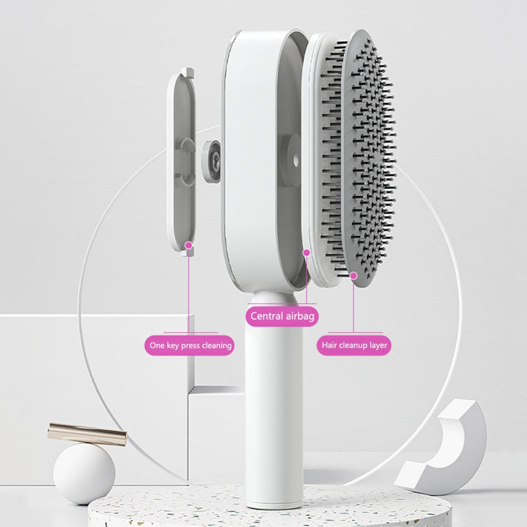 Innovative self-cleaning hair brush in fuchsia & white for painless detangling on all hair types. Scalp health.