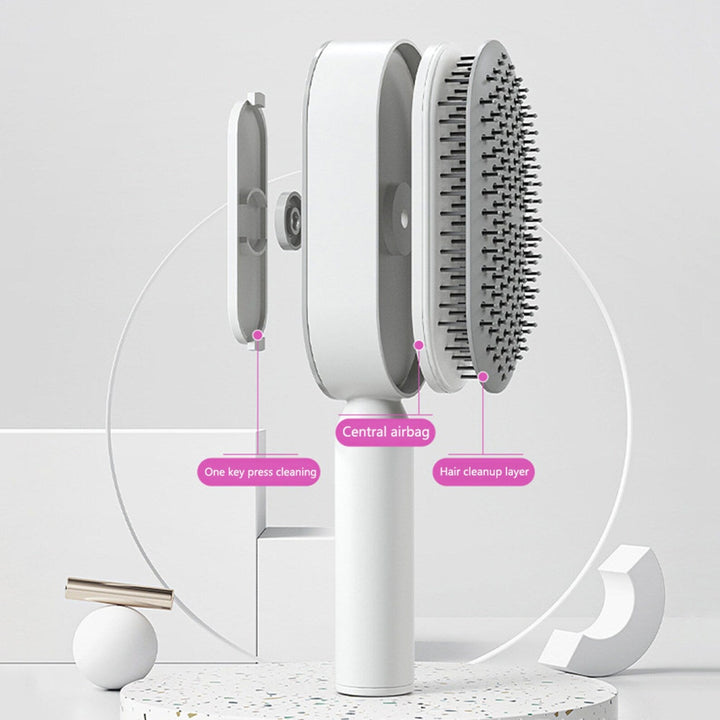 Innovative self-cleaning hair brush in fuchsia & white for painless detangling on all hair types. Scalp health.