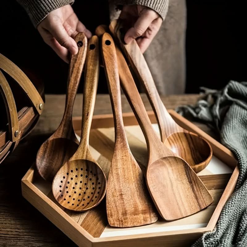 Full set of eco-friendly teak wood kitchen utensils for sustainable cooking. Non-stick safe & minimalist design.
