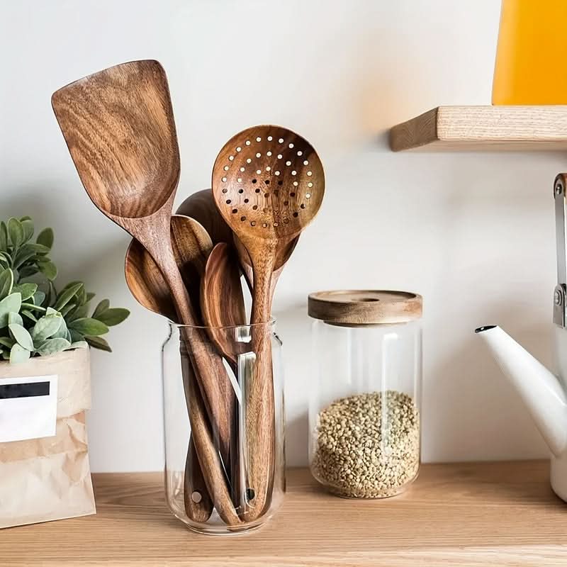 Close-up of a smooth teak wooden spatula, perfect for non-stick pans & eco-conscious home cooking.