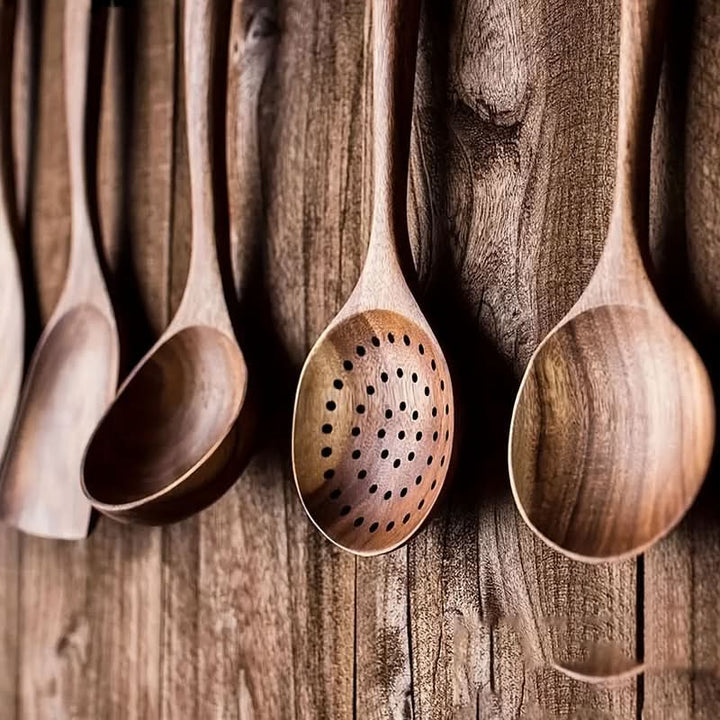 Elegant wooden serving set made from sustainable teak, featuring a minimalist design for any kitchenware collection.