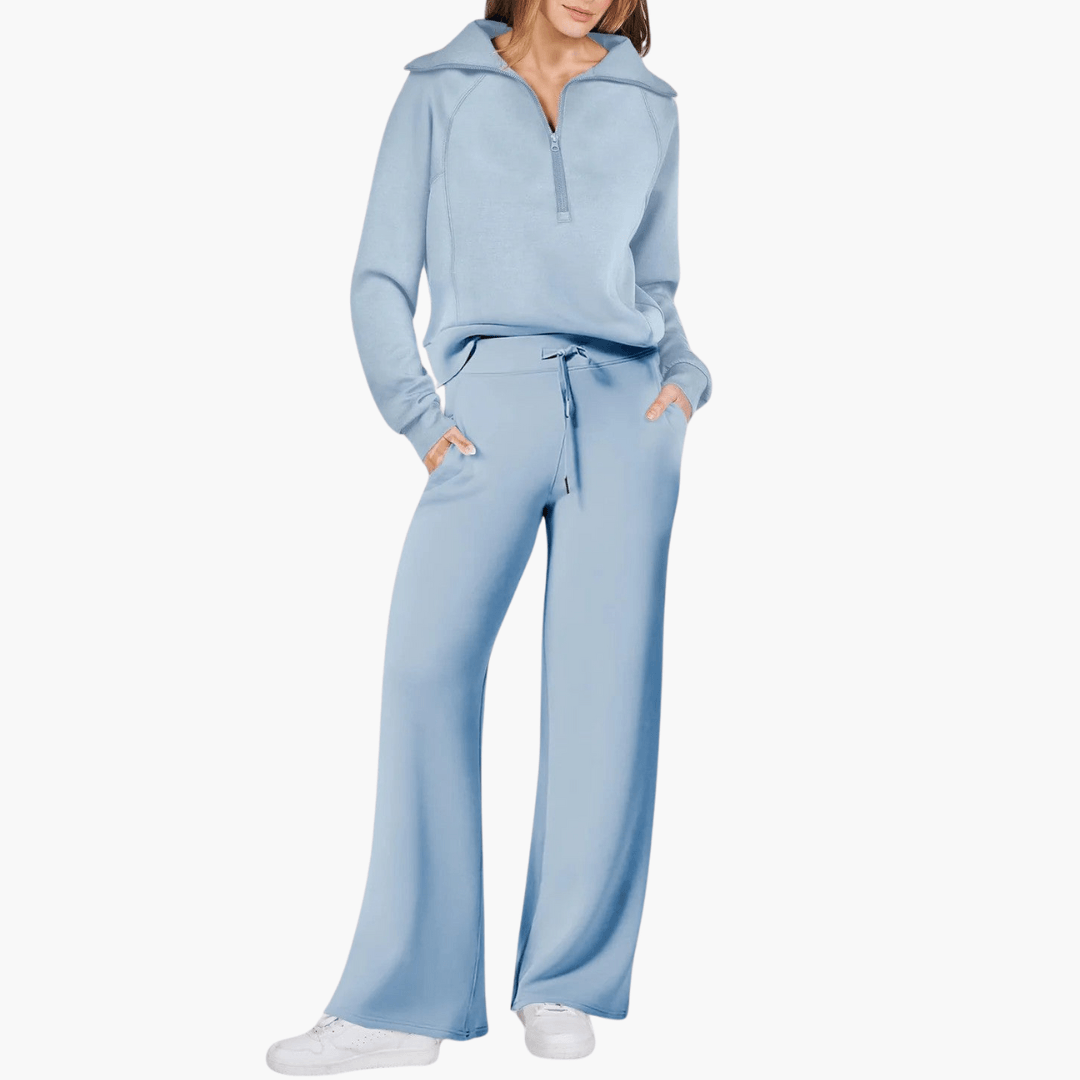 Stylish women's wide leg lounge pants, paired with a zip-up hoodie for a comfy, casual two-piece leisurewear set.
