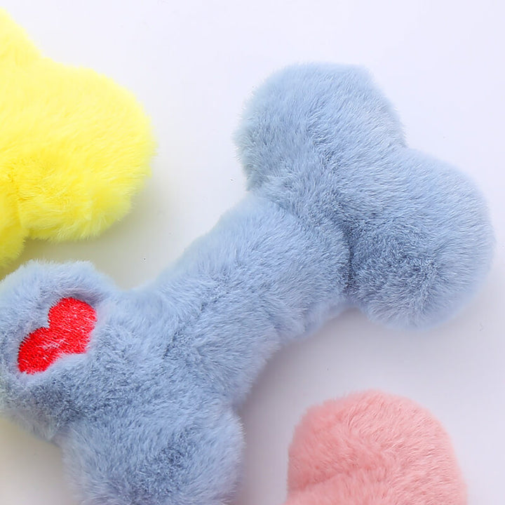 Funny Bone plush dog toy with squeaker, durable chew for dogs, engaging pet enrichment supply