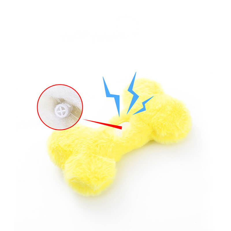 Close-up of Funny Bone squeaky dog toy, pet plush chew for interactive play and dental health