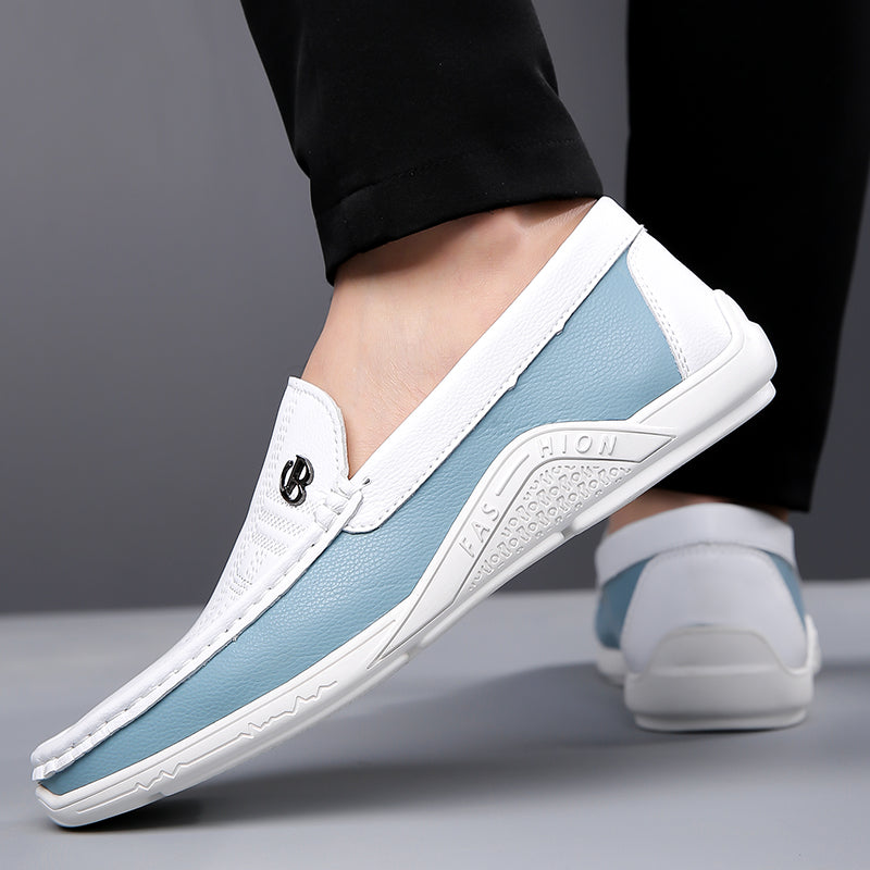 Fashionable men's two-tone loafers, providing slip-on ease and a polished appearance.