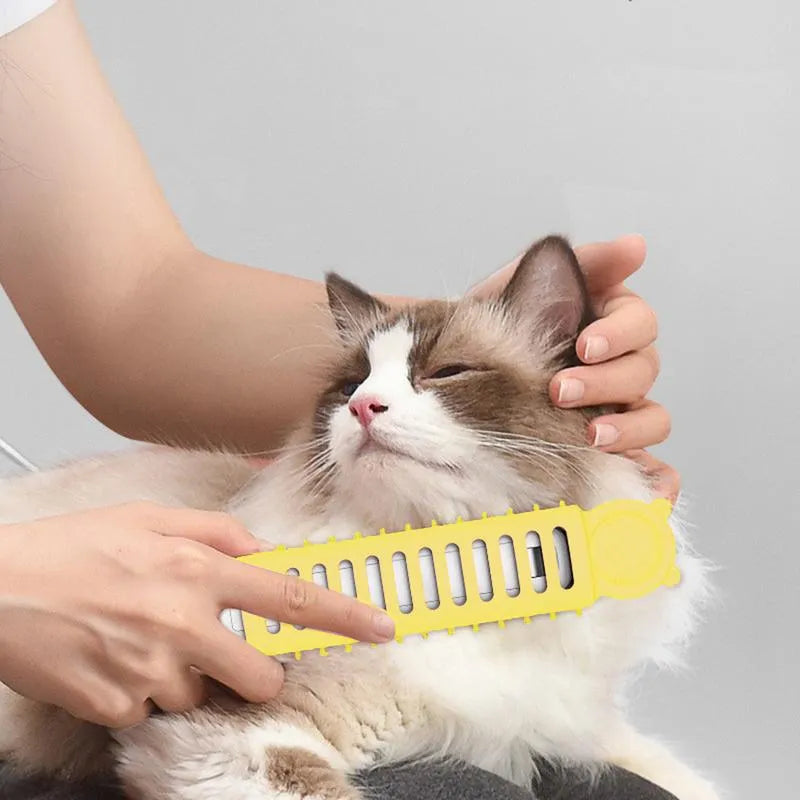 Dog enjoying a grooming session with the Gentle Heat Pet Grooming Brush, a pet supply for fur care.