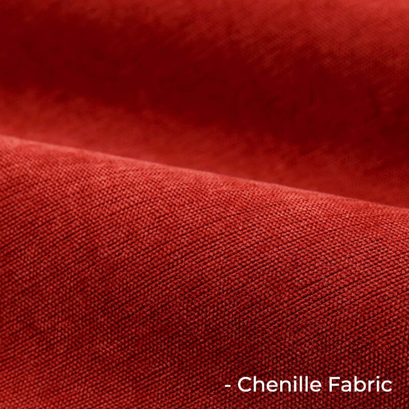 Full view of a living room sofa with a cream geometric chenille cover, pet protection, stylish