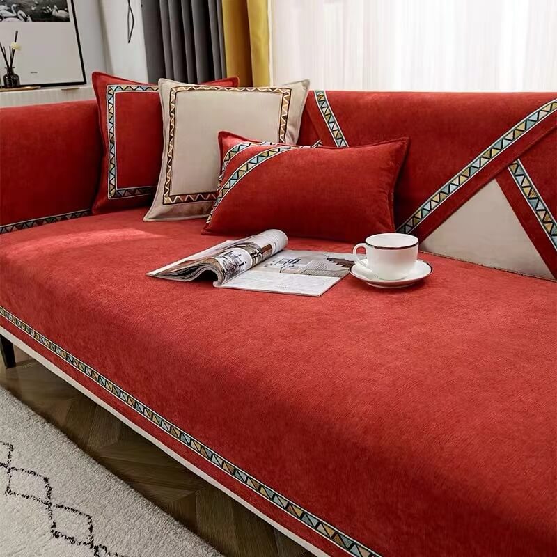 Unisex geometric chenille couch cover in a modern living space, non-slip, furniture protection