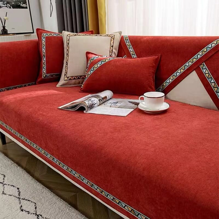 Unisex geometric chenille couch cover in a modern living space, non-slip, furniture protection