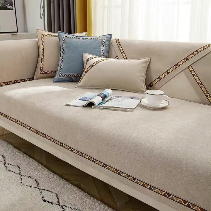 Stylish geometric chenille sofa cover with a textured surface, designed for pet owners, home decor