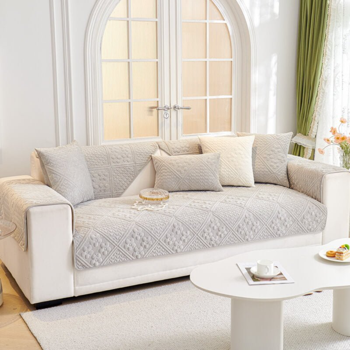 Universal non-slip sectional sofa cover featuring a modern geometric leaves pattern, pet & kid friendly