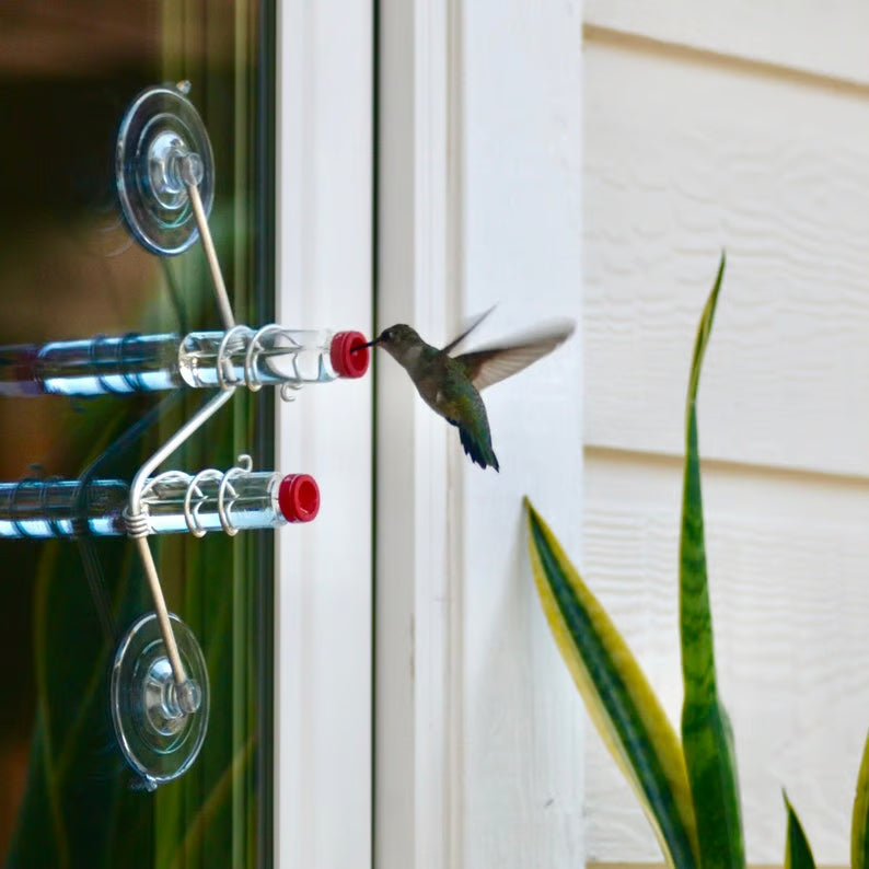 Geometric window hummingbird feeder, modern copper & aluminum design for easy bird watching.