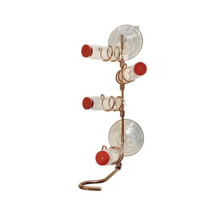 Packaging for geometric window hummingbird feeder, emphasizing durability and modern design.