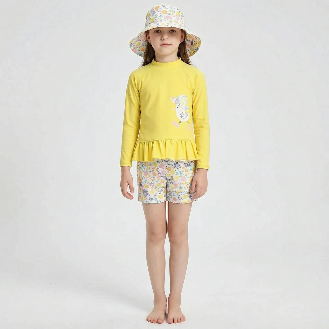 Childrens long sleeve floral rash guard swimsuit & sun hat. Girls' swimwear for sun protection & beach play.