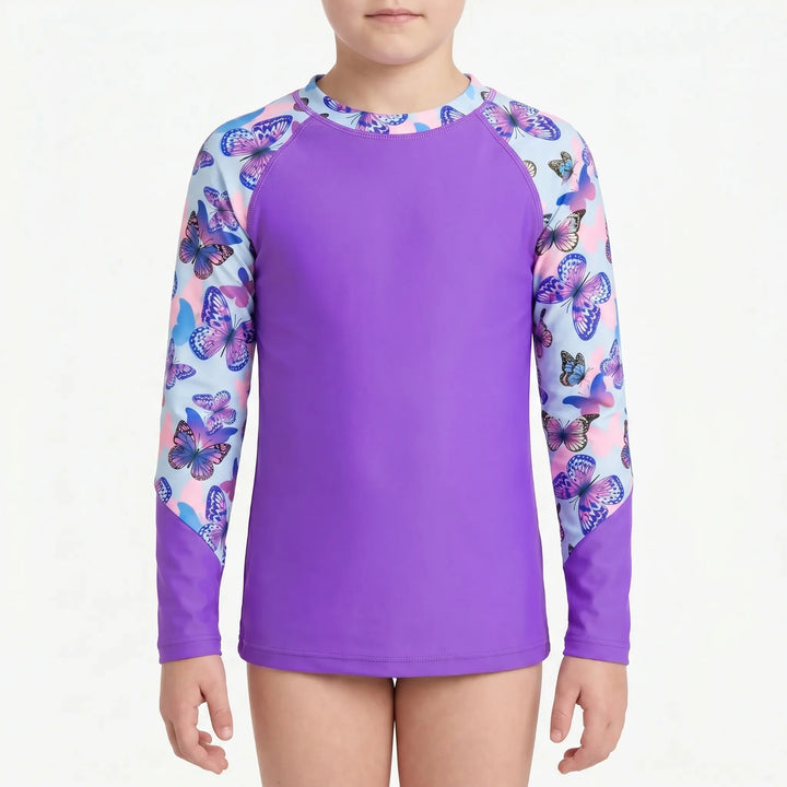 Active girls' long-sleeve rash guard swim top. Quick-dry beachwear for sun protection during water sports.