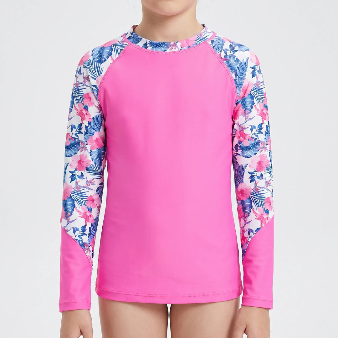 Comfortable girls' long-sleeve rash guard swim shirt. Sun protection for kids' active play in the water.