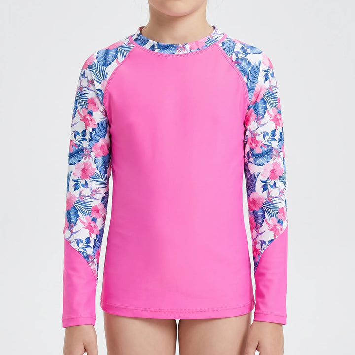 Comfortable girls' long-sleeve rash guard swim shirt. Sun protection for kids' active play in the water.