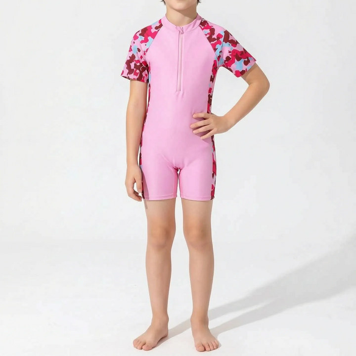 Reefina girls' short-sleeve rash guard swimsuit, a protective one-piece for kids' summer beachwear.