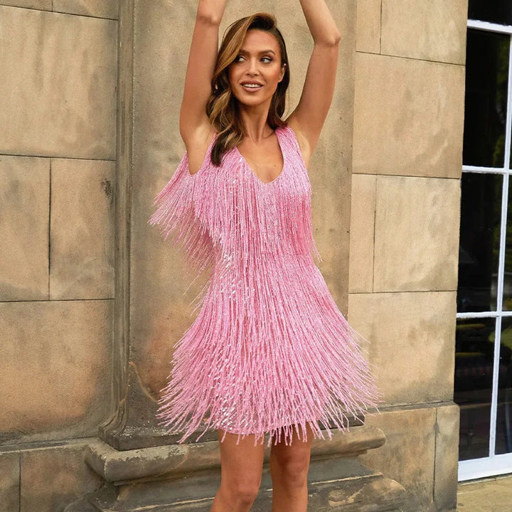 Vibrant women's sequin and fringe dance outfit, a sparkling V-neck mini dress for any party.