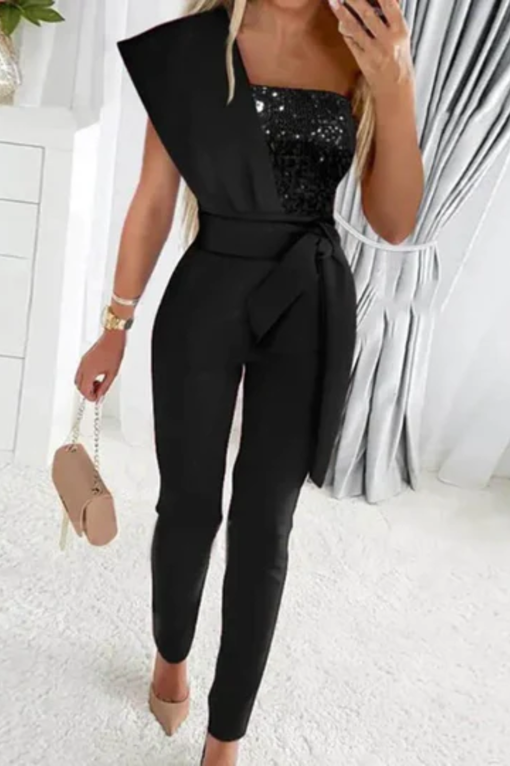 Full-length women's sequin jumpsuit, featuring a dazzling sparkle. Perfect formal party outfit for night events.