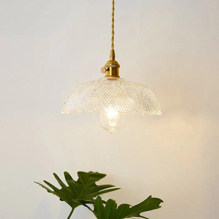 Modern glass hanging lamp, a beautiful addition to any dining room's home decor.