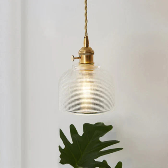 Elegant glass pendant light, a sophisticated fixture for your home's dining room.