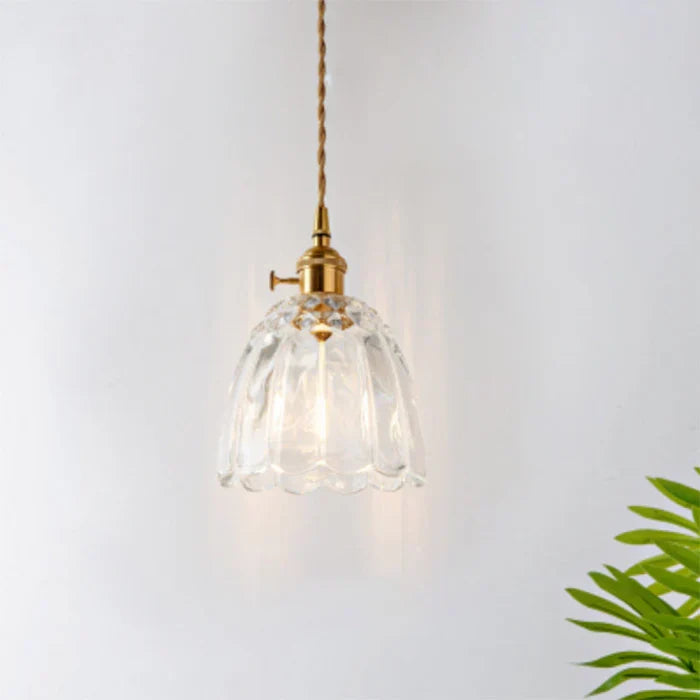 Decorative glass hanging light for elegant dining room interiors, home decor.