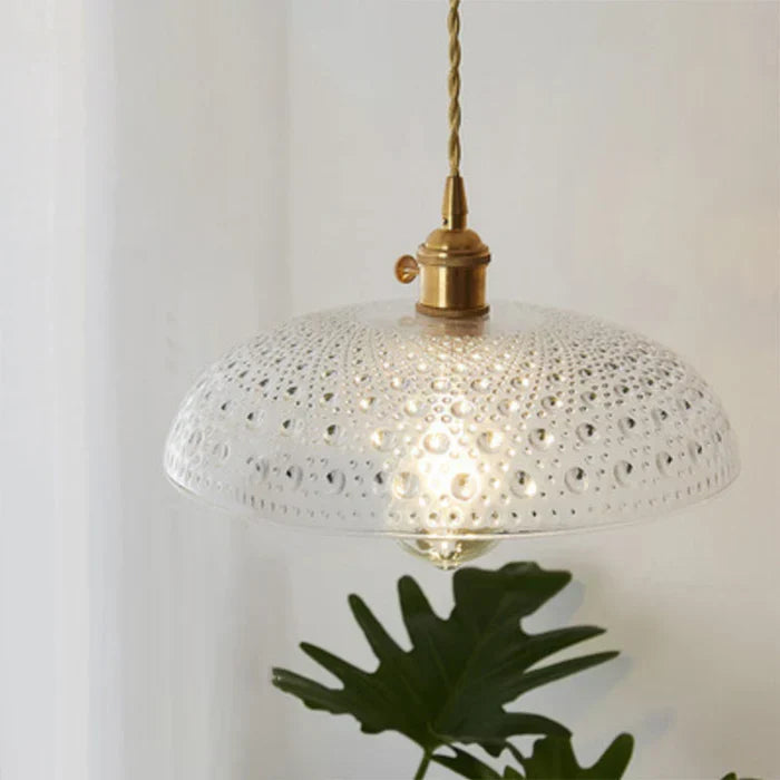 Minimalist glass pendant lamp, suitable for modern dining room and kitchen island decor.