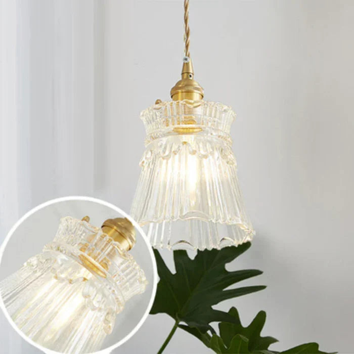 OpulentGlow glass pendant, a sophisticated modern lighting choice for dining rooms.
