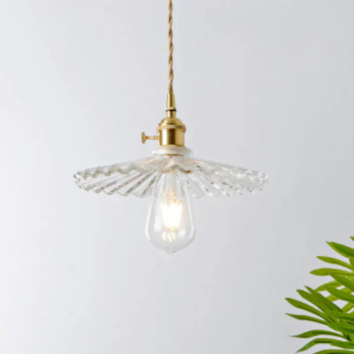OpulentGlow hanging glass lamp, a modern focal point for industrial dining rooms.