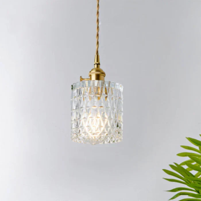 Stylish glass pendant light, ideal for kitchen island or dining room home decor.