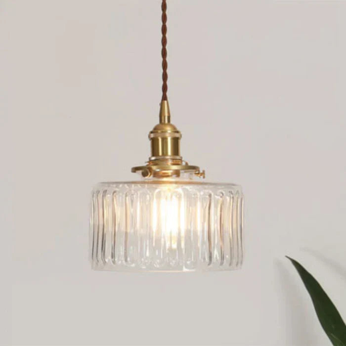 OpulentGlow glass pendant lamp. Modern lighting solution for elegant dining areas.