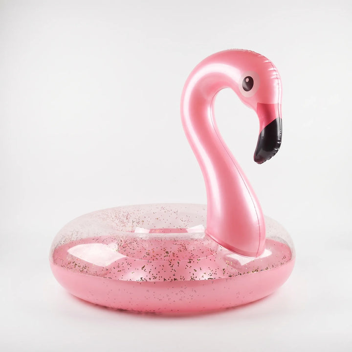 Fun sparkling flamingo inflatable pool float, a durable water toy and beach accessory for kids & adults.